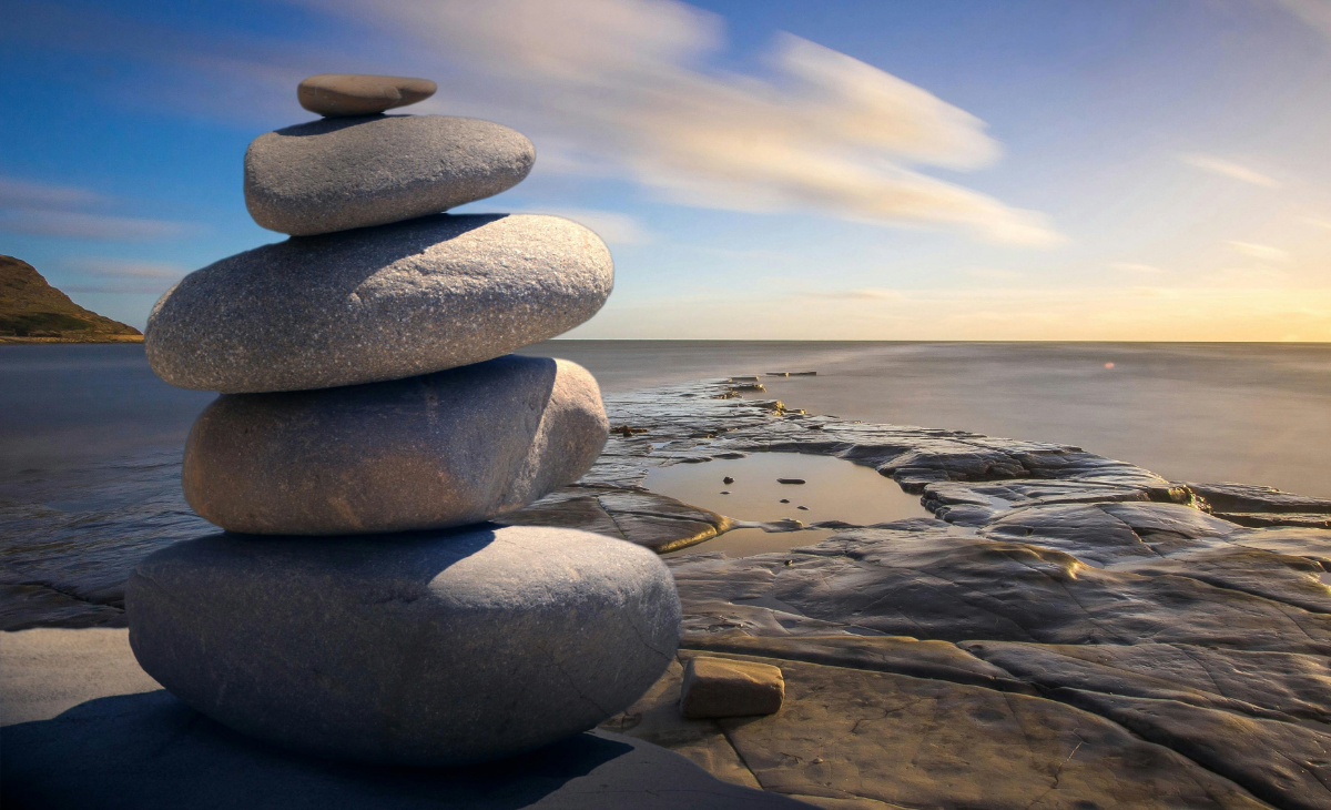 Image of stones stacked on top of each other symbolizing relaxation